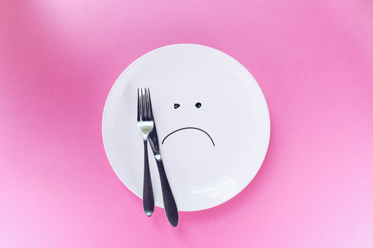 empty sad plate intended to represent fasting, or Intermittent fasting