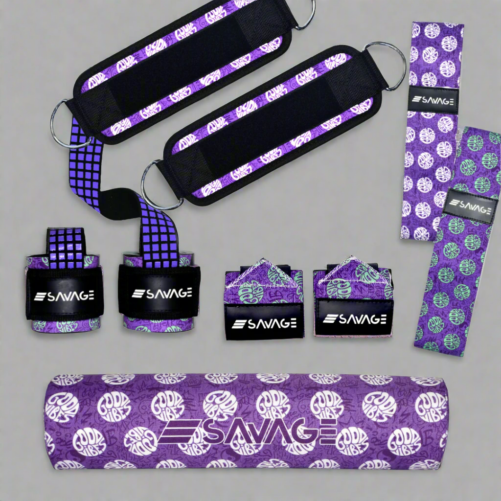 Set of purple and black Savage exercise equipment on a white background