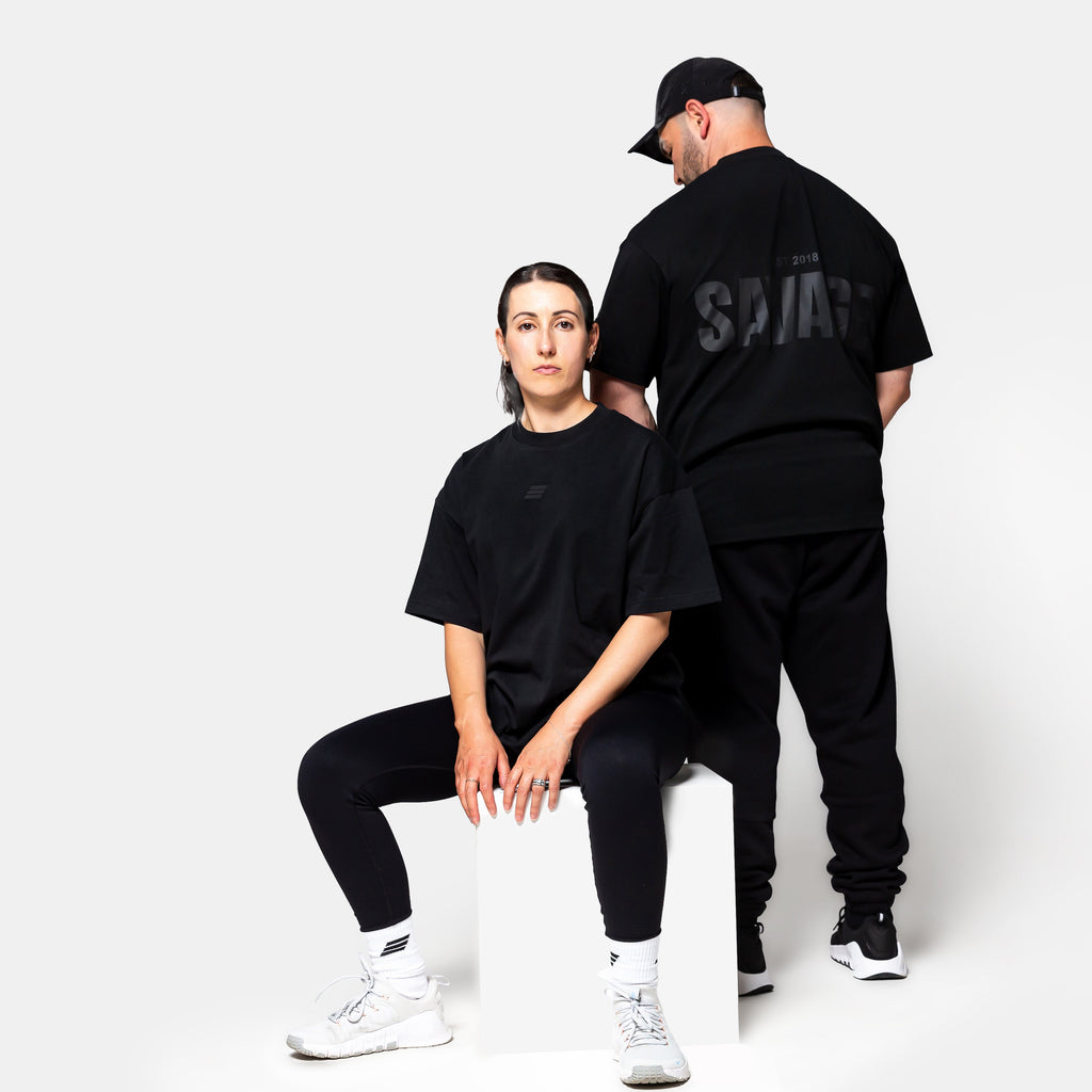 Savage Fitness oversized black tee front and back view gym apparel