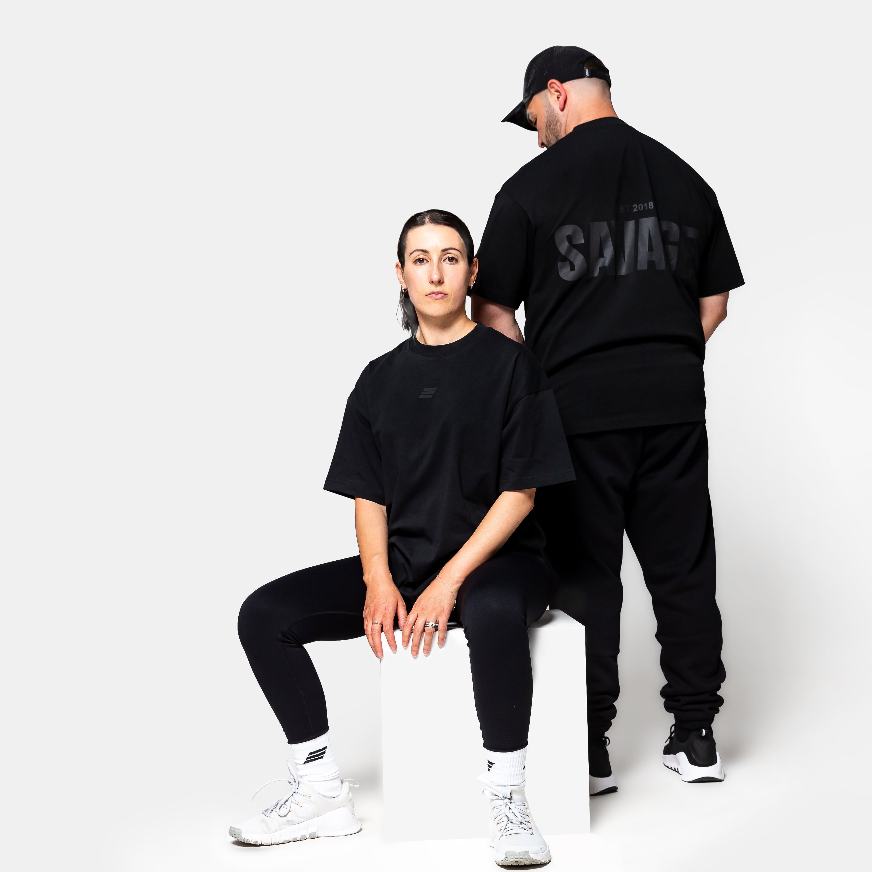 Savage Fitness oversized black tee front and back view gym apparel