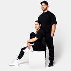 Savage Fitness oversized black tee mens and womens gym lifestyle image