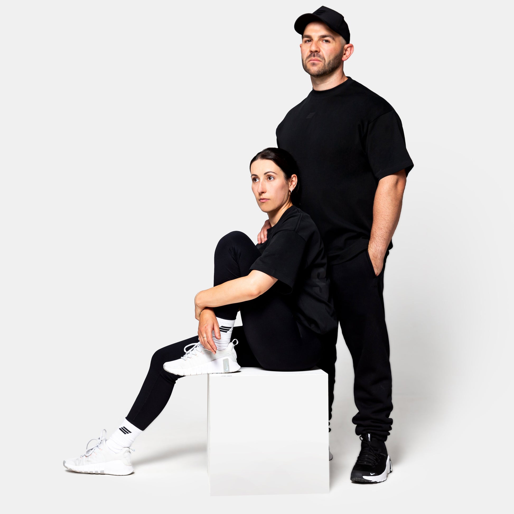 Savage Fitness oversized black tee mens and womens gym lifestyle image