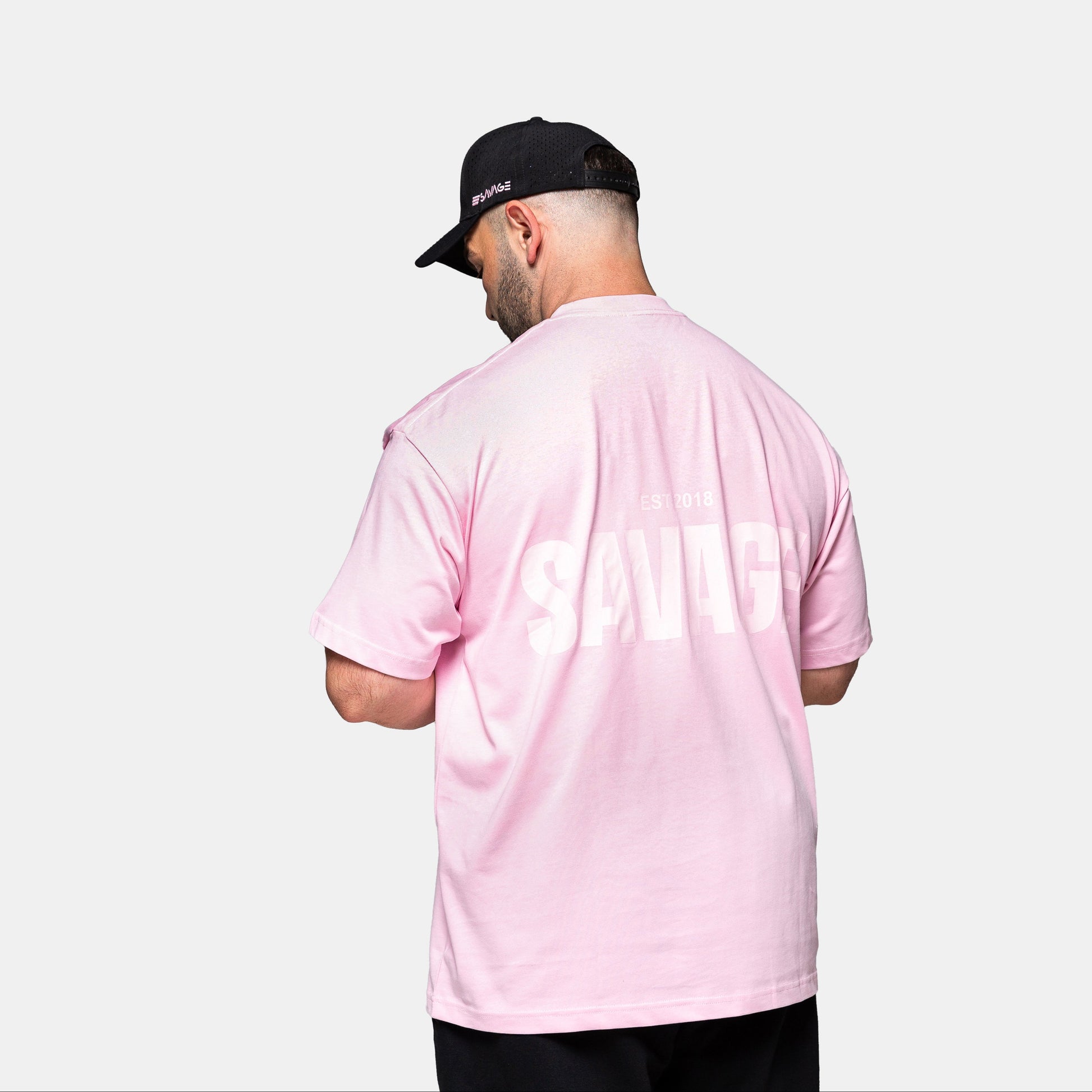 Savage Fitness oversized pink tee mens back view with large SAVAGE print