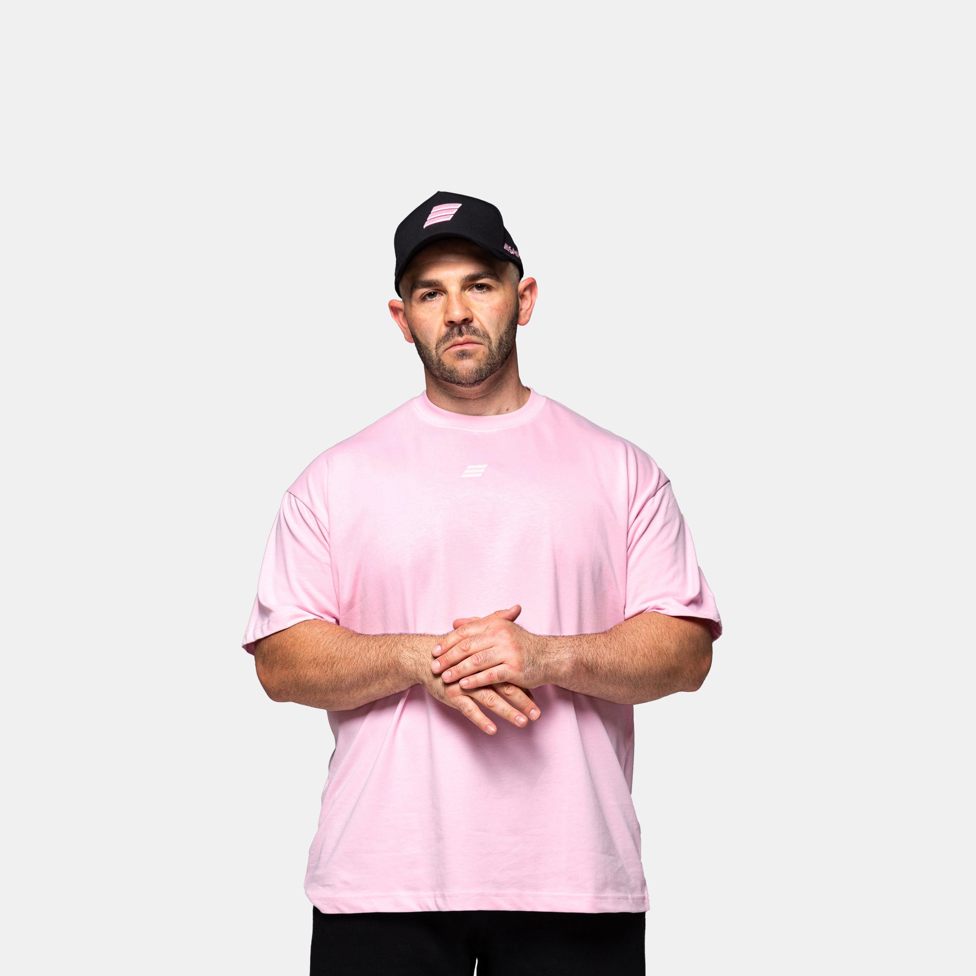 Savage Fitness oversized pink tee mens side profile gym apparel