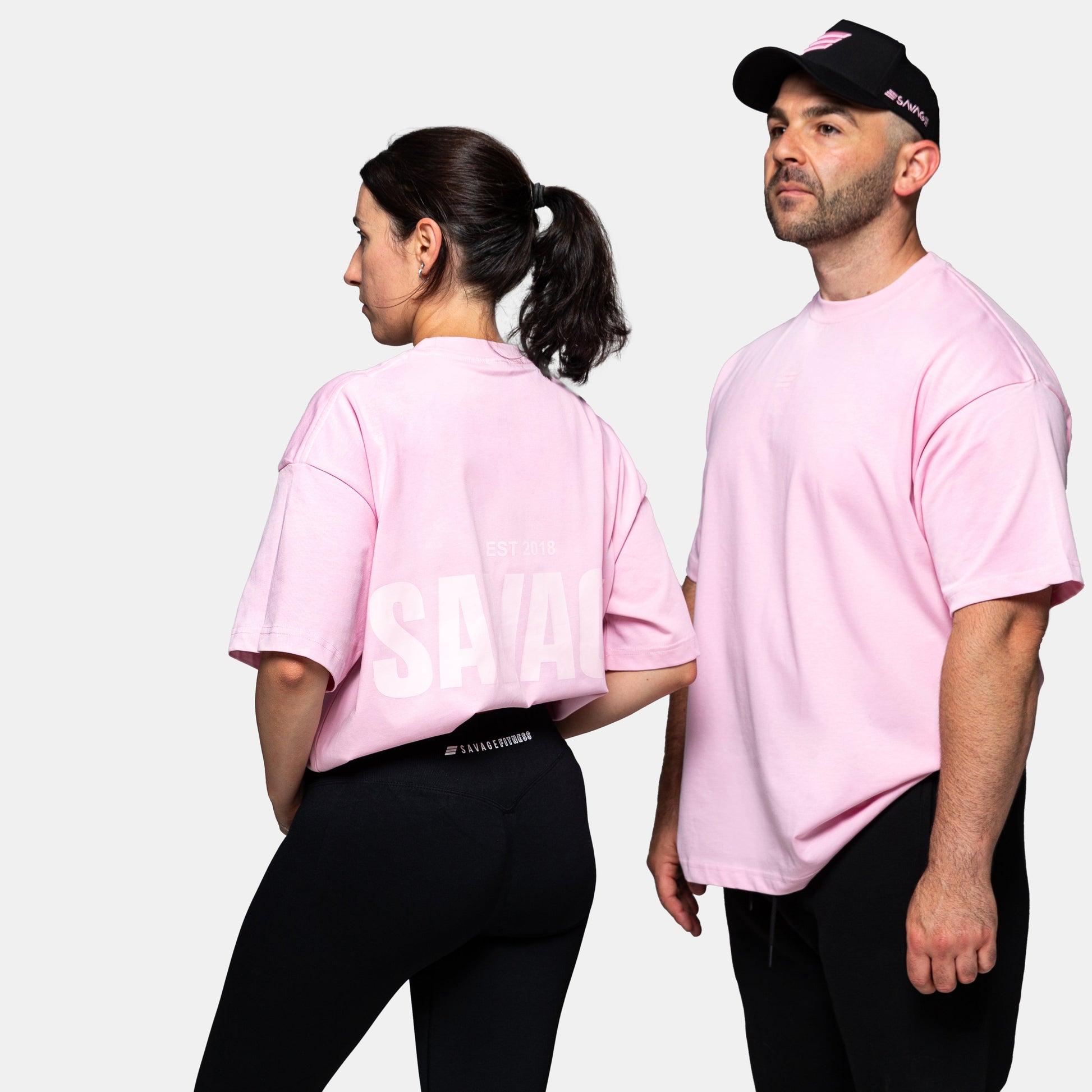 Savage Fitness oversized pink tee mens and womens gym lifestyle image