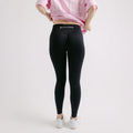 girl wearing black seamless leggings with glute contouring shape
