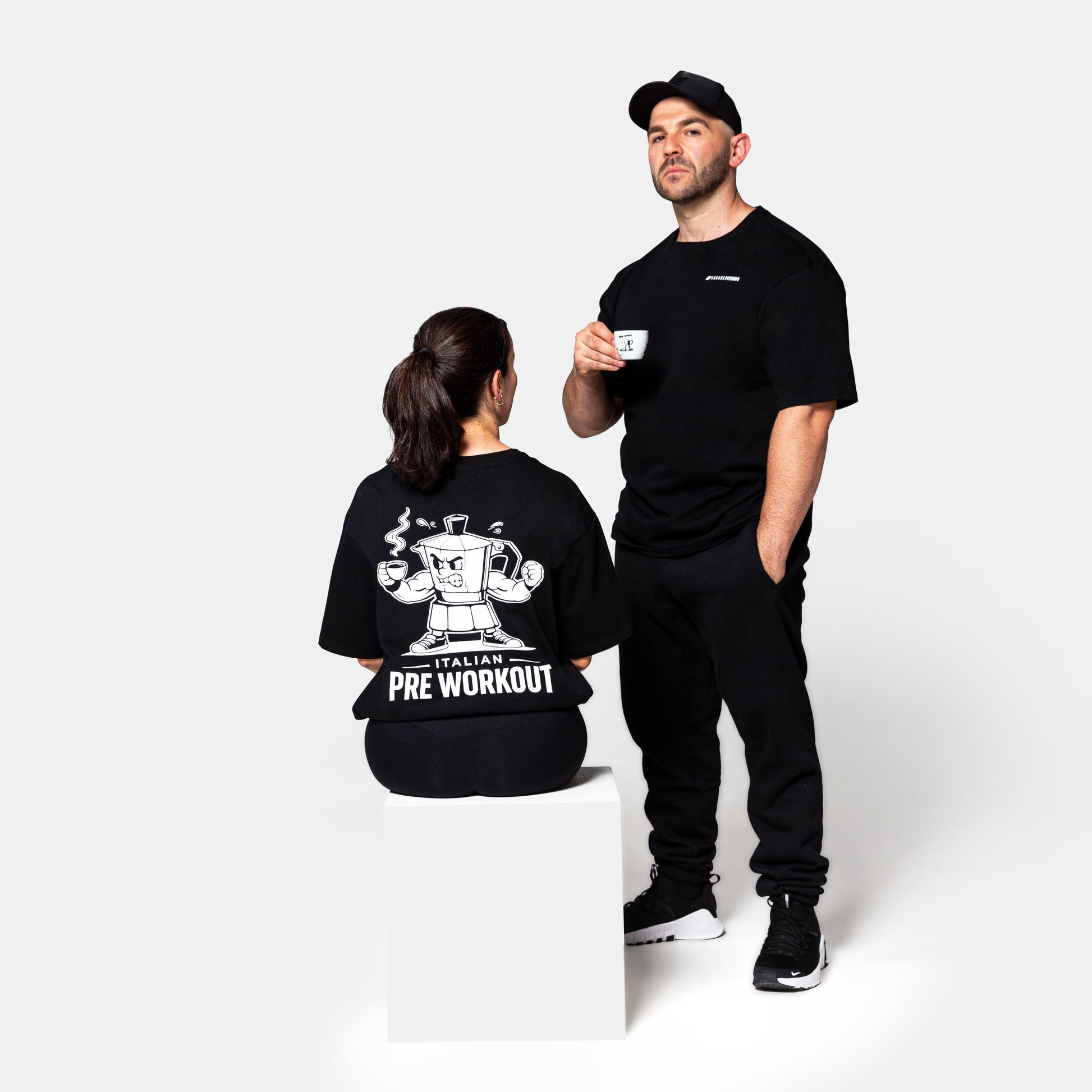 Savage Italian Pre Workout Tee black womens seated back view oversized gym tee